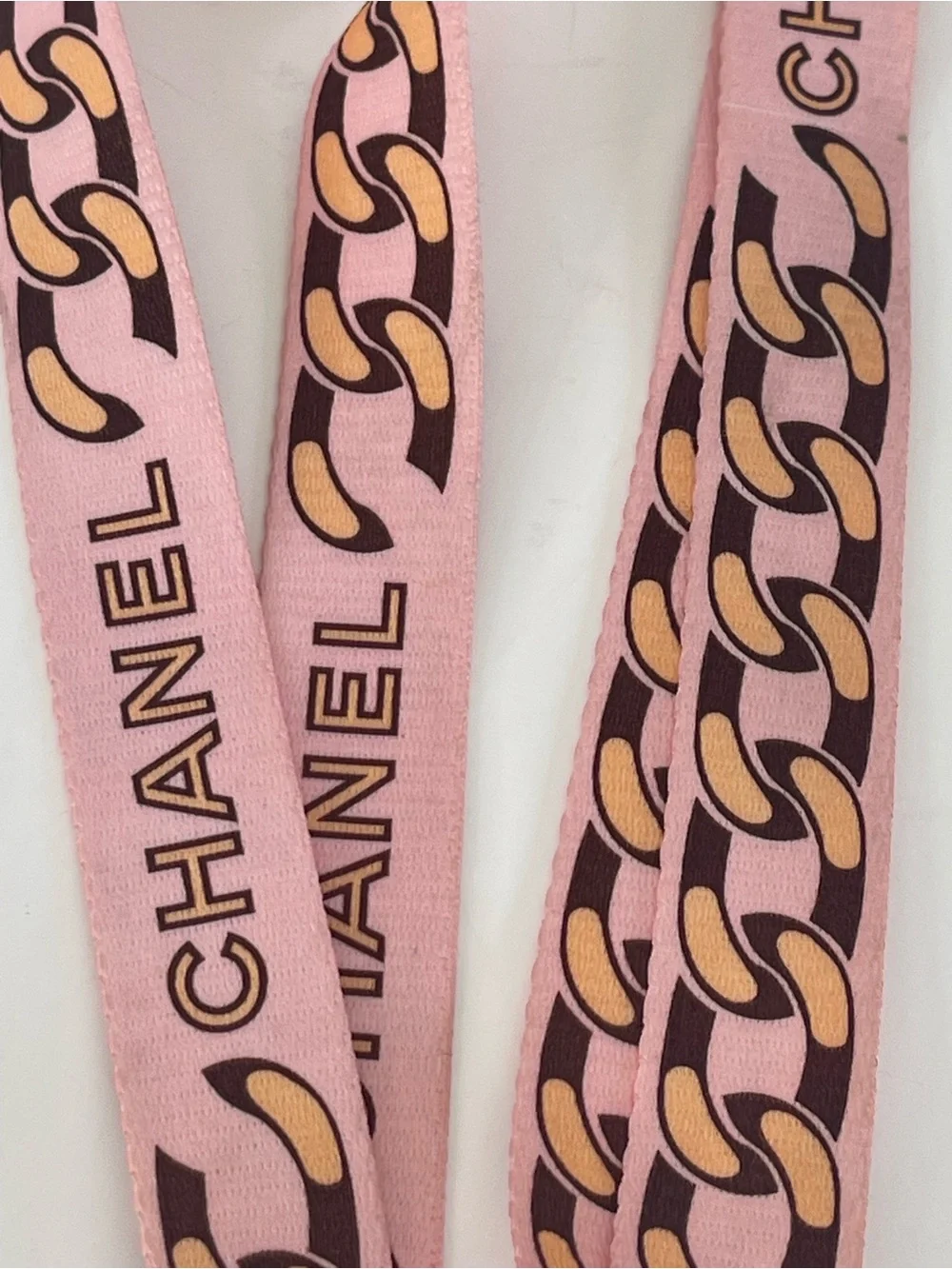 CHANEL Pink Chain-Print Lanyard with Gold Hardware